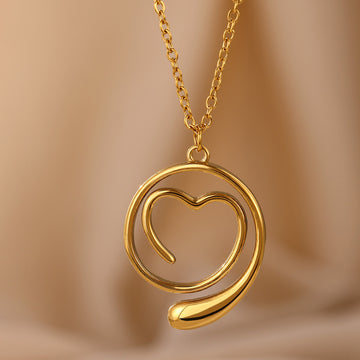 Collar minimalista con colgante de gota en forma de corazón geométrico para mujer